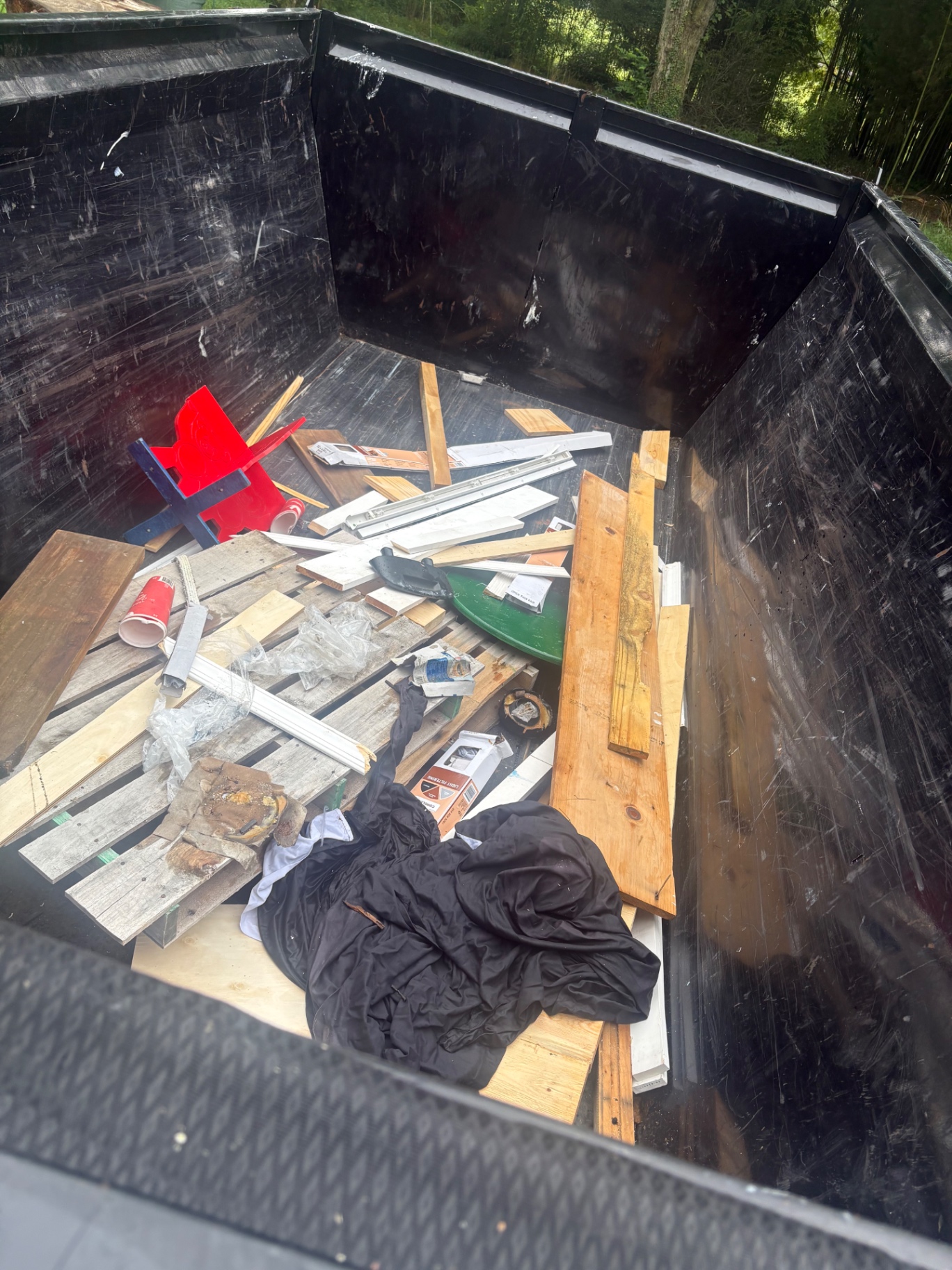 Renovation debris loaded and hauled